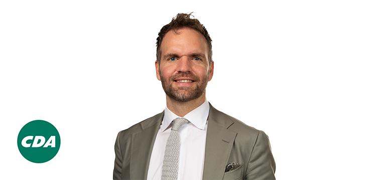 Portretfoto Derk Boswijk met partijlogo CDA