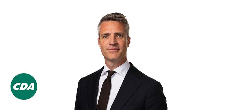 Portretfoto Jan Arie Koorevaar met partijlogo CDA