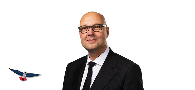 Portretfoto René Claassen met partijlogo PVV