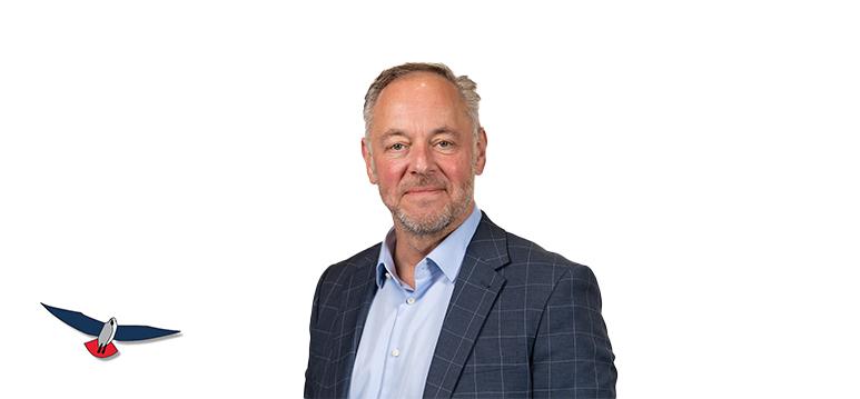 Portretfoto Erwin Prickaertz met partijlogo PVV