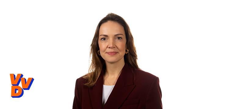 Portretfoto Bente Becker met partijlogo VVD