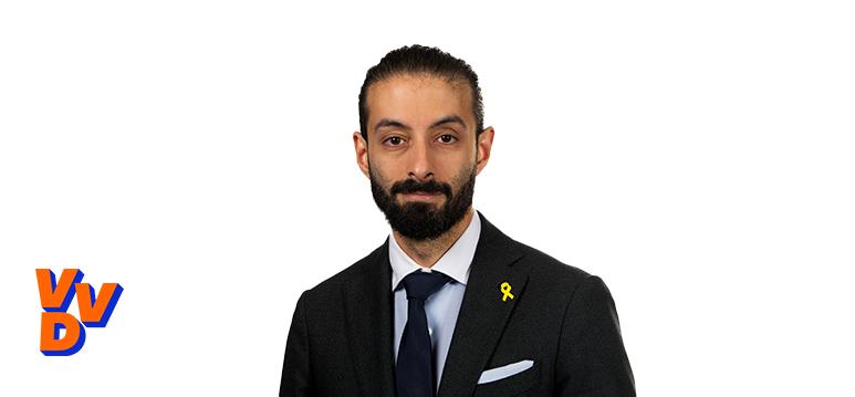 Portretfoto Ulysse Ellian met partijlogo VVD