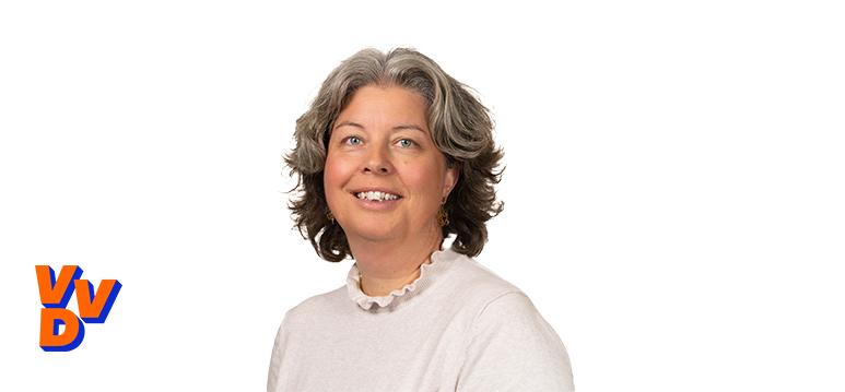 Portretfoto Renate den Hollander met partijlogo VVD