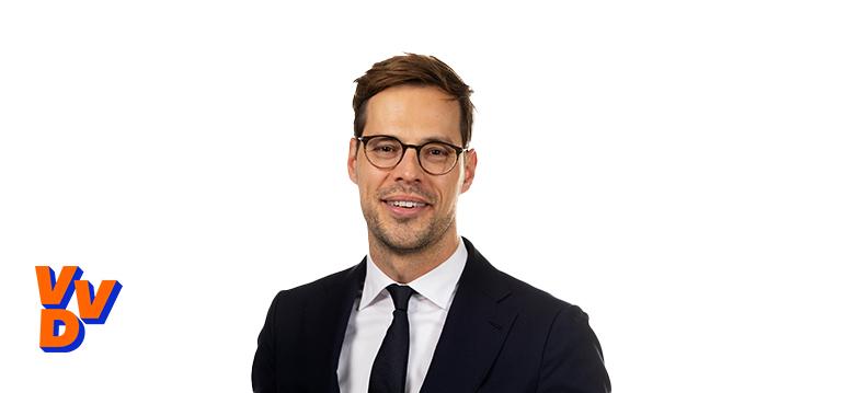 Portretfoto Jurgen Nobel met partijlogo VVD