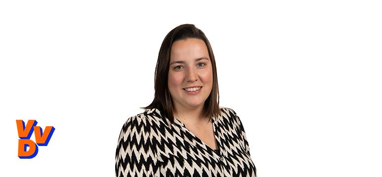 Portretfoto Wendel met partijlogo VVD.