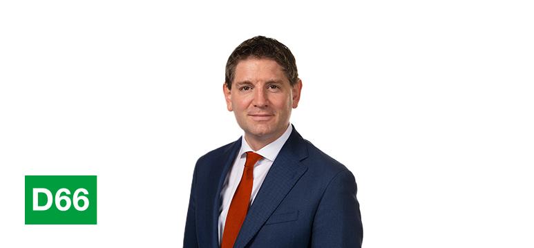 Portretfoto Paternotte met partijlogo D66.