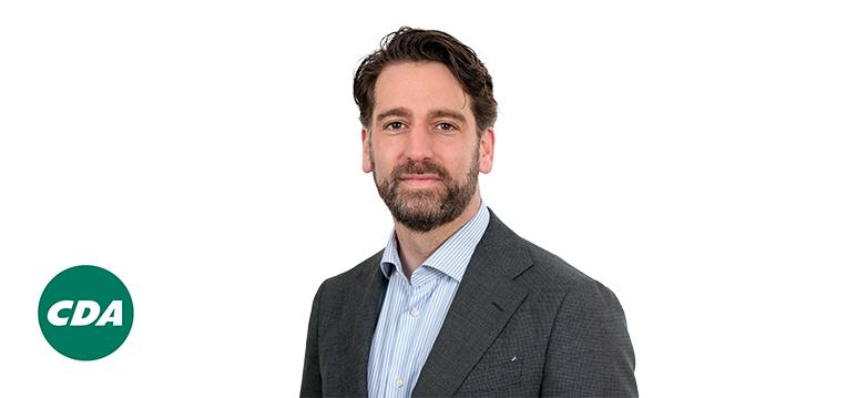 Portretfoto Joris Lohman met partijlogo CDA