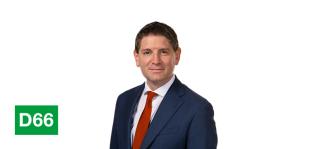 Portretfoto Paternotte met partijlogo D66.